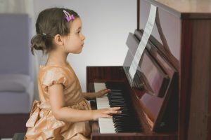Little Girl Playing Piano